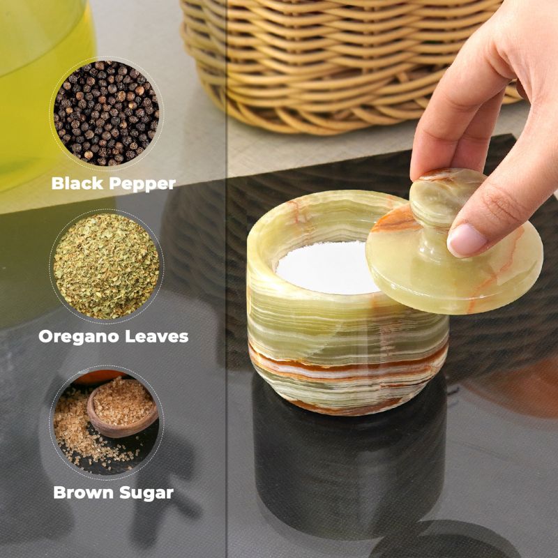 Green onyx salt cellar used for storing pepper, oregano, and sugar