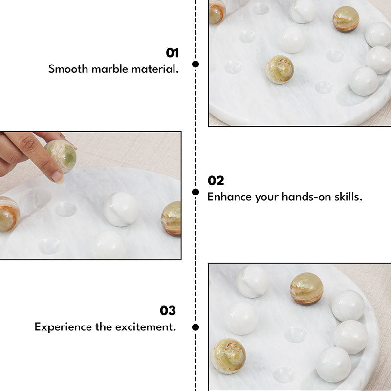 Green and white marble Tic Tac Toe game set showing hand movement