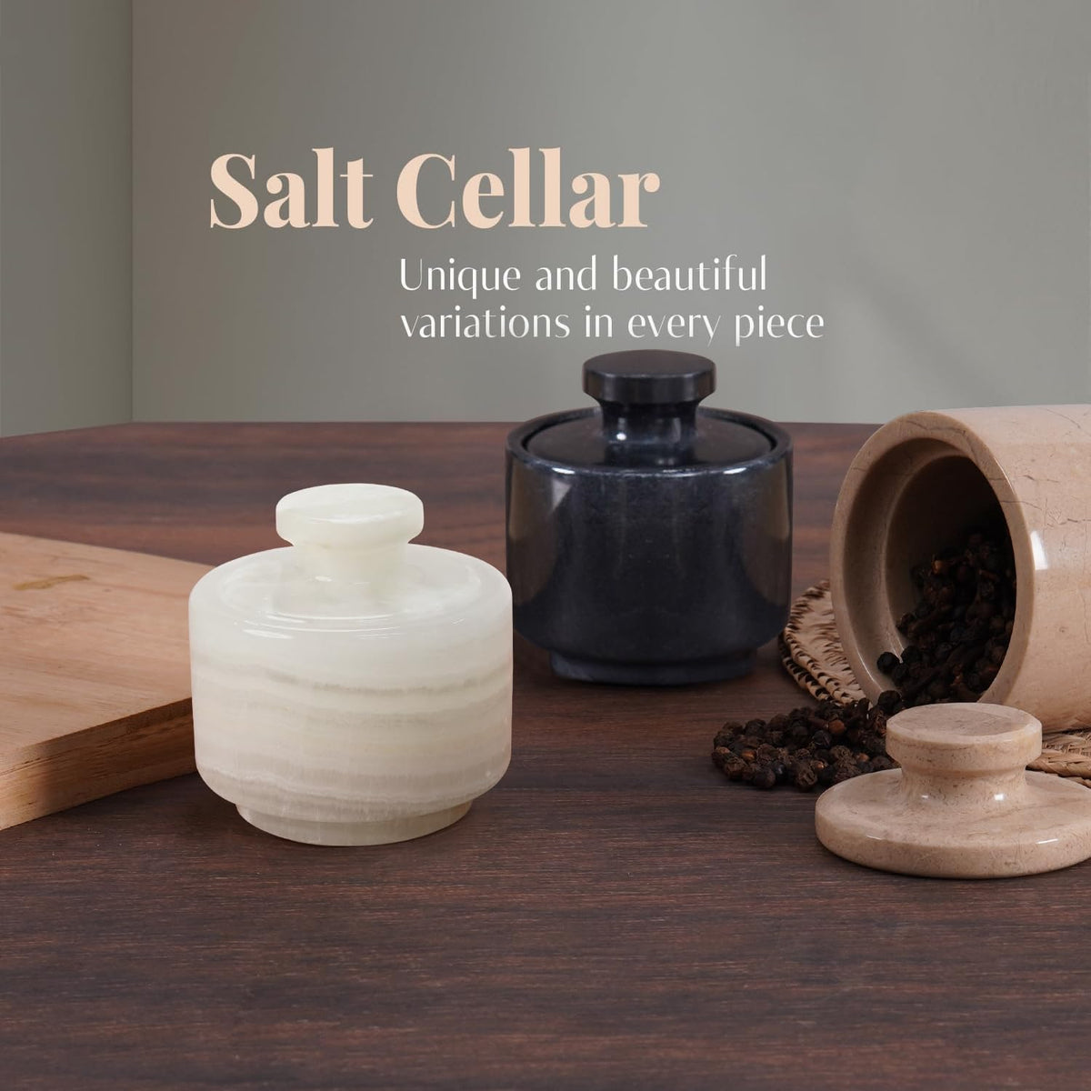 Collection of salt cellars in white onyx, black, and marinara marble