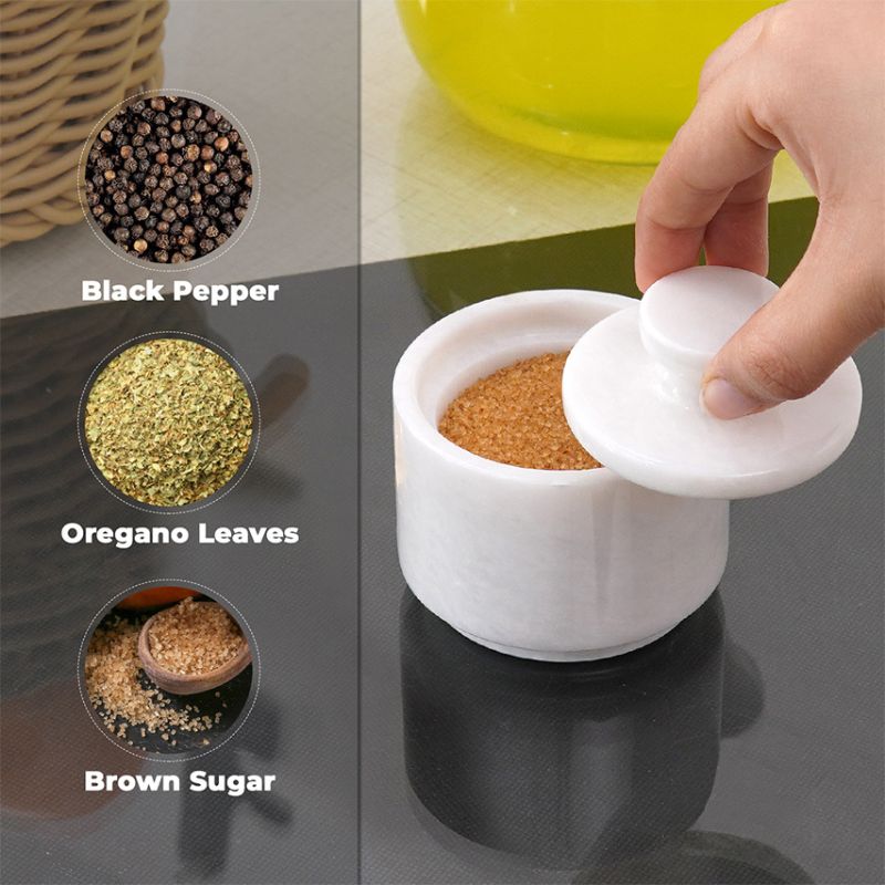 Salt cellar filled with brown sugar, used for pepper, oregano, spices