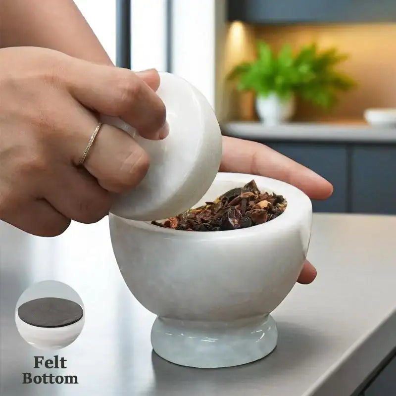Front view of natural white marble mortar and pestle with smooth stone surface