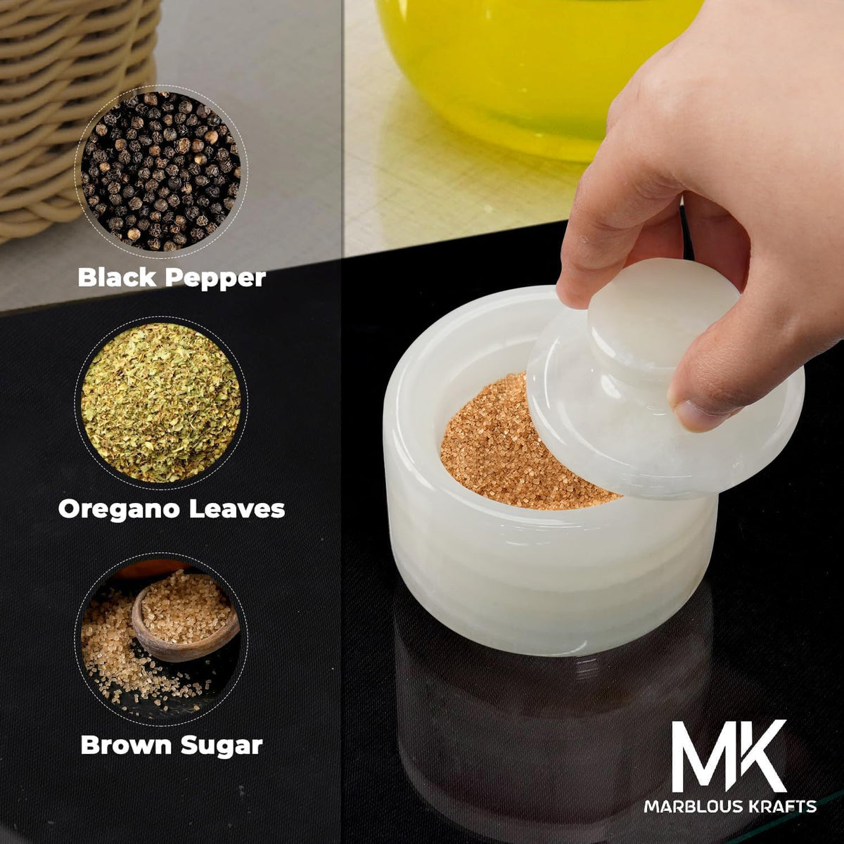White onyx marble salt cellar filled with brown sugar, used for black pepper and oregano leaves